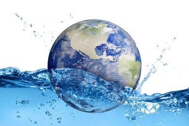 Image of Save water concept. Earth falling into water against white background