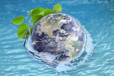 Image of Save water concept. Earth and plant branches falling into water