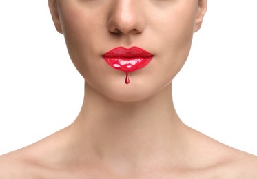 Image of Red liquid lipstick dripping from woman's lip against white background, closeup