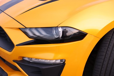 Photo of Closeup view of modern bright cabriolet. Vehicle