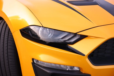 Photo of Closeup view of modern bright cabriolet. Vehicle