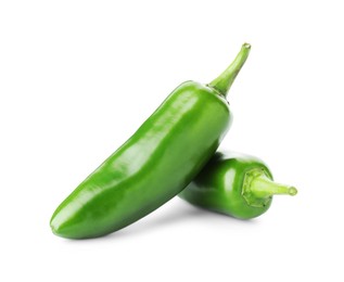 Photo of Two green jalapeno peppers isolated on white
