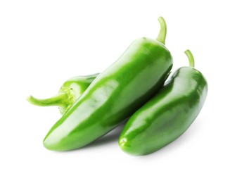 Photo of Many green jalapeno peppers isolated on white