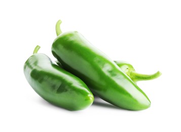 Photo of Many green jalapeno peppers isolated on white