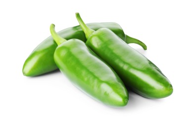 Photo of Many green jalapeno peppers isolated on white