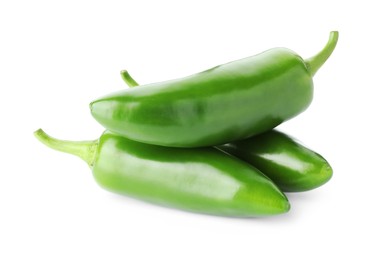 Photo of Many green jalapeno peppers isolated on white