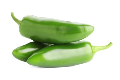 Photo of Many green jalapeno peppers isolated on white