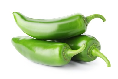 Photo of Many green jalapeno peppers isolated on white