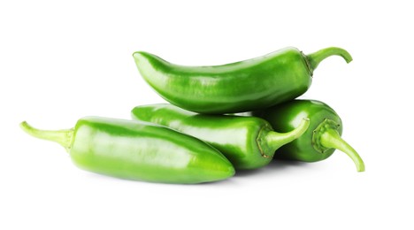 Photo of Many green jalapeno peppers isolated on white
