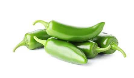 Photo of Many green jalapeno peppers isolated on white