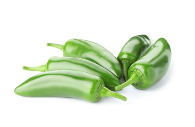 Photo of Many green jalapeno peppers isolated on white