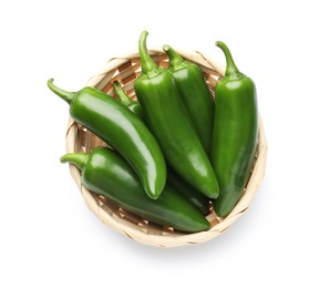 Photo of Green jalapeno peppers in basket isolated on white, top view