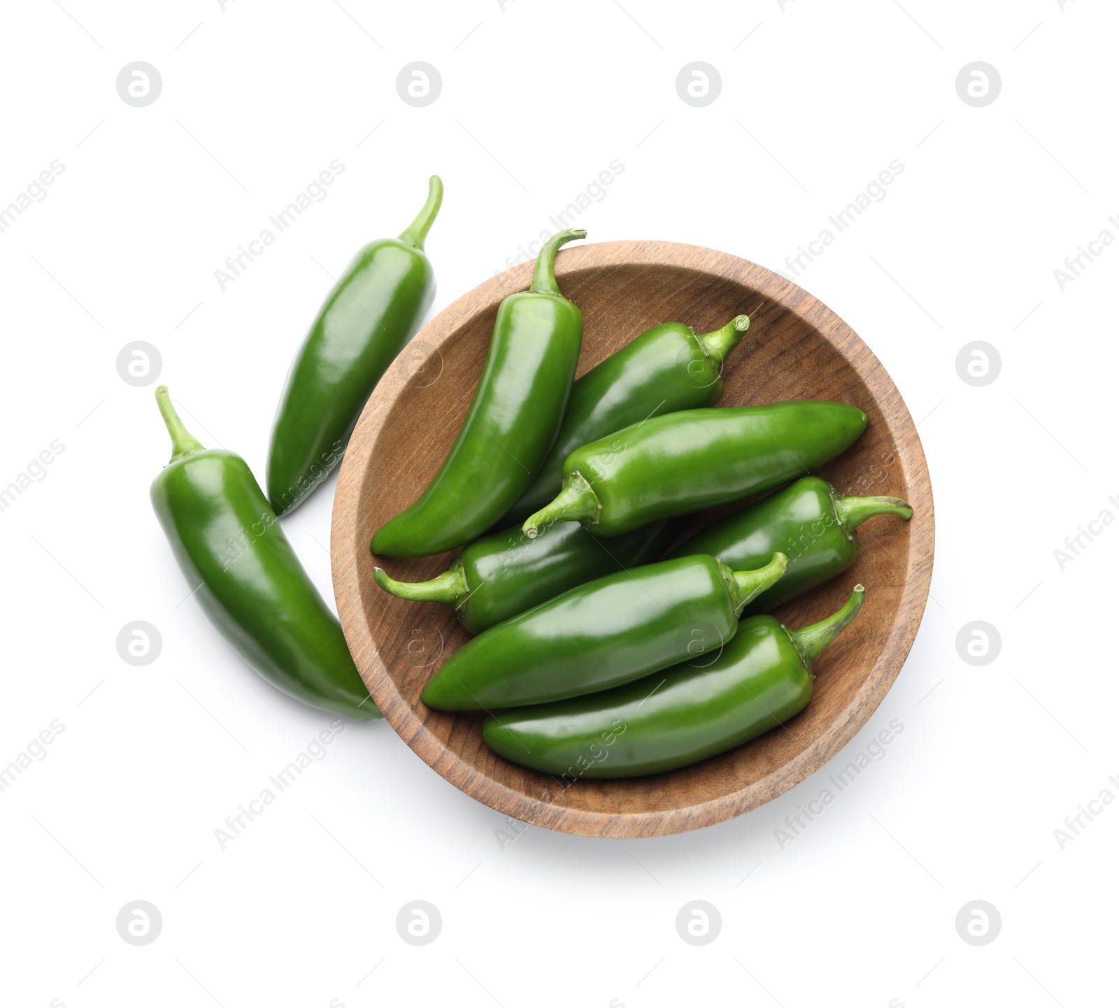 Photo of Green jalapeno peppers in bowl isolated on white, top view