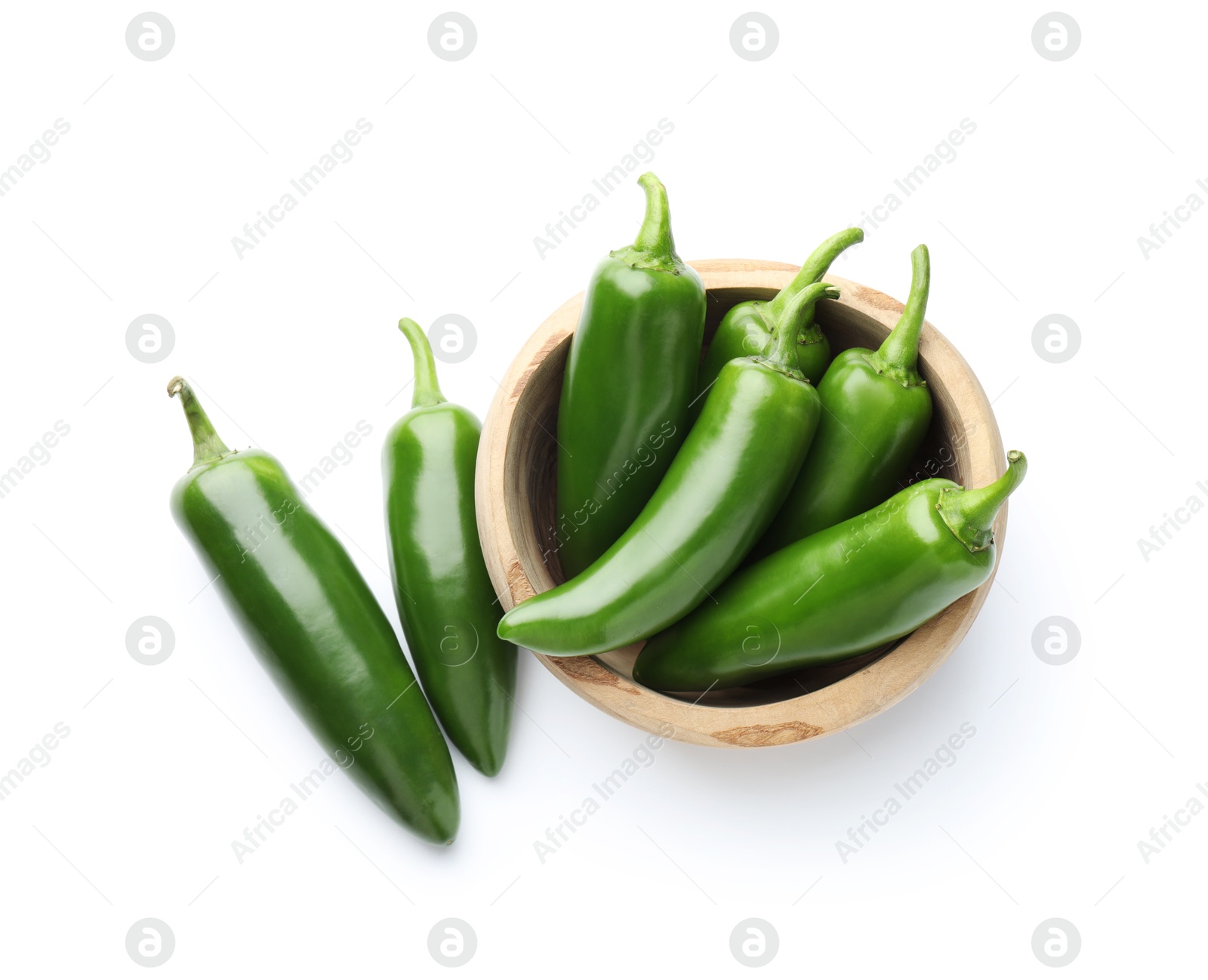 Photo of Green jalapeno peppers in bowl isolated on white, top view