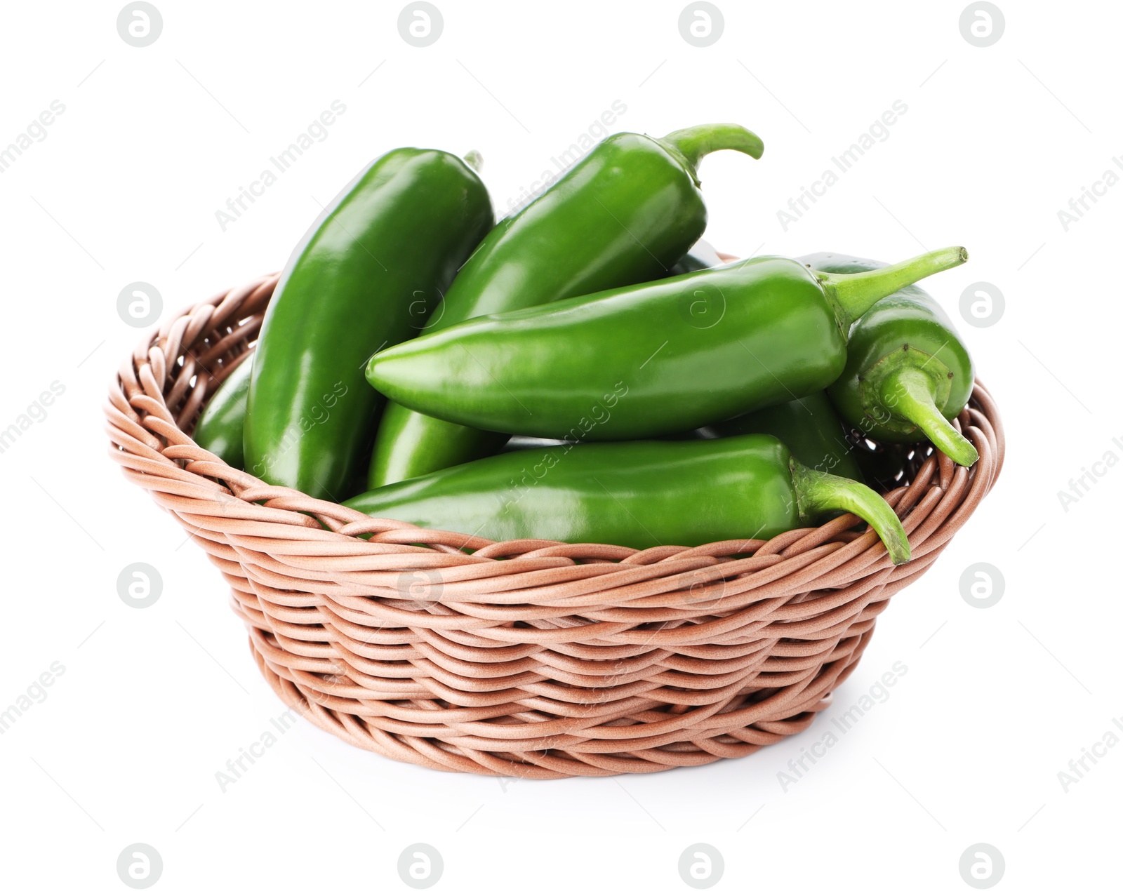 Photo of Green jalapeno peppers in basket isolated on white