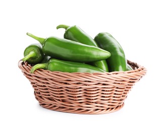 Photo of Green jalapeno peppers in basket isolated on white