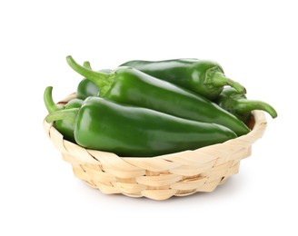 Photo of Green jalapeno peppers in basket isolated on white