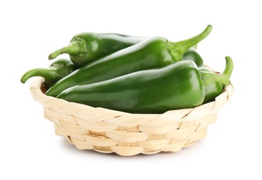 Photo of Green jalapeno peppers in basket isolated on white