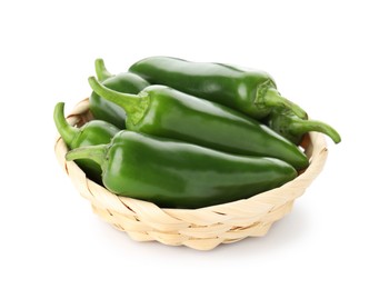 Photo of Green jalapeno peppers in basket isolated on white