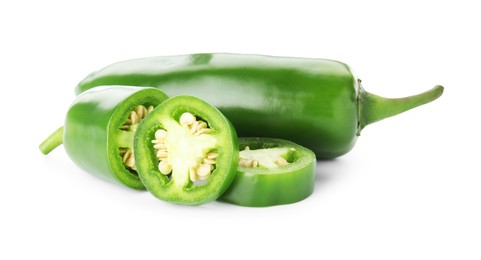Photo of Pieces of green jalapeno pepper isolated on white