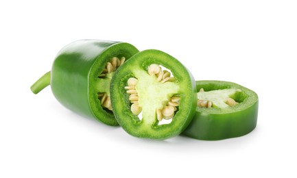 Photo of Pieces of green jalapeno pepper isolated on white