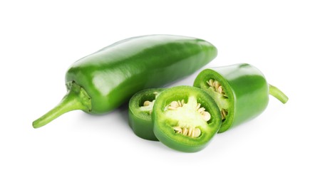 Photo of Pieces of green jalapeno pepper isolated on white