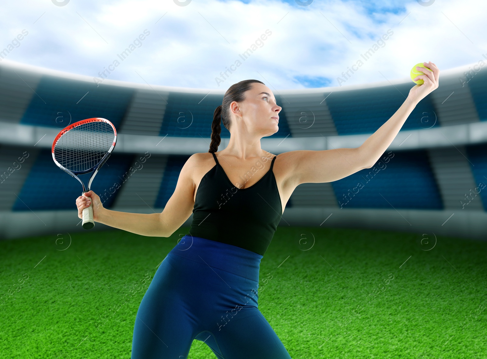 Image of Woman playing tennis at stadium, low angle view