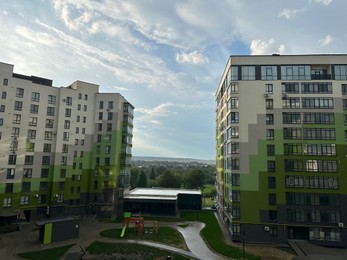 Photo of Residential complex with modern buildings in city