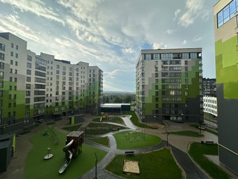 Photo of Residential complex with modern buildings in city