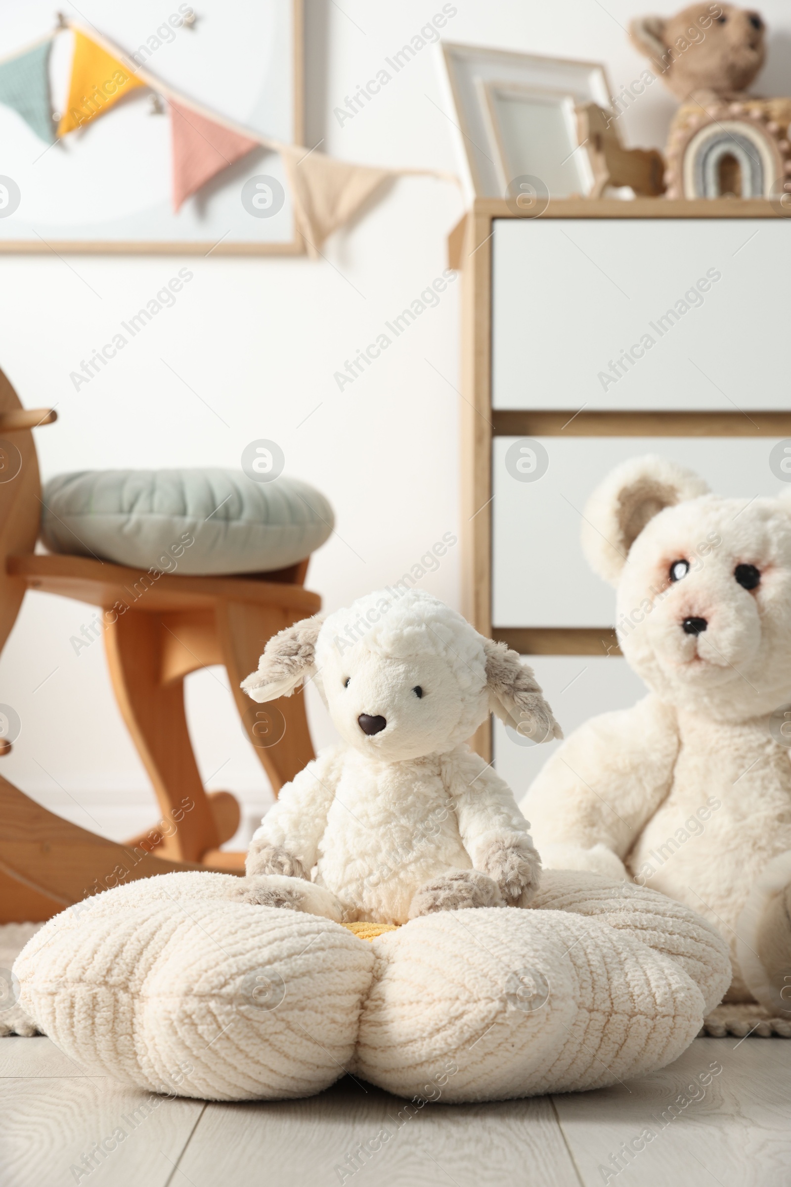 Photo of Different cute toys and furniture in child's room