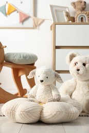 Photo of Different cute toys and furniture in child's room