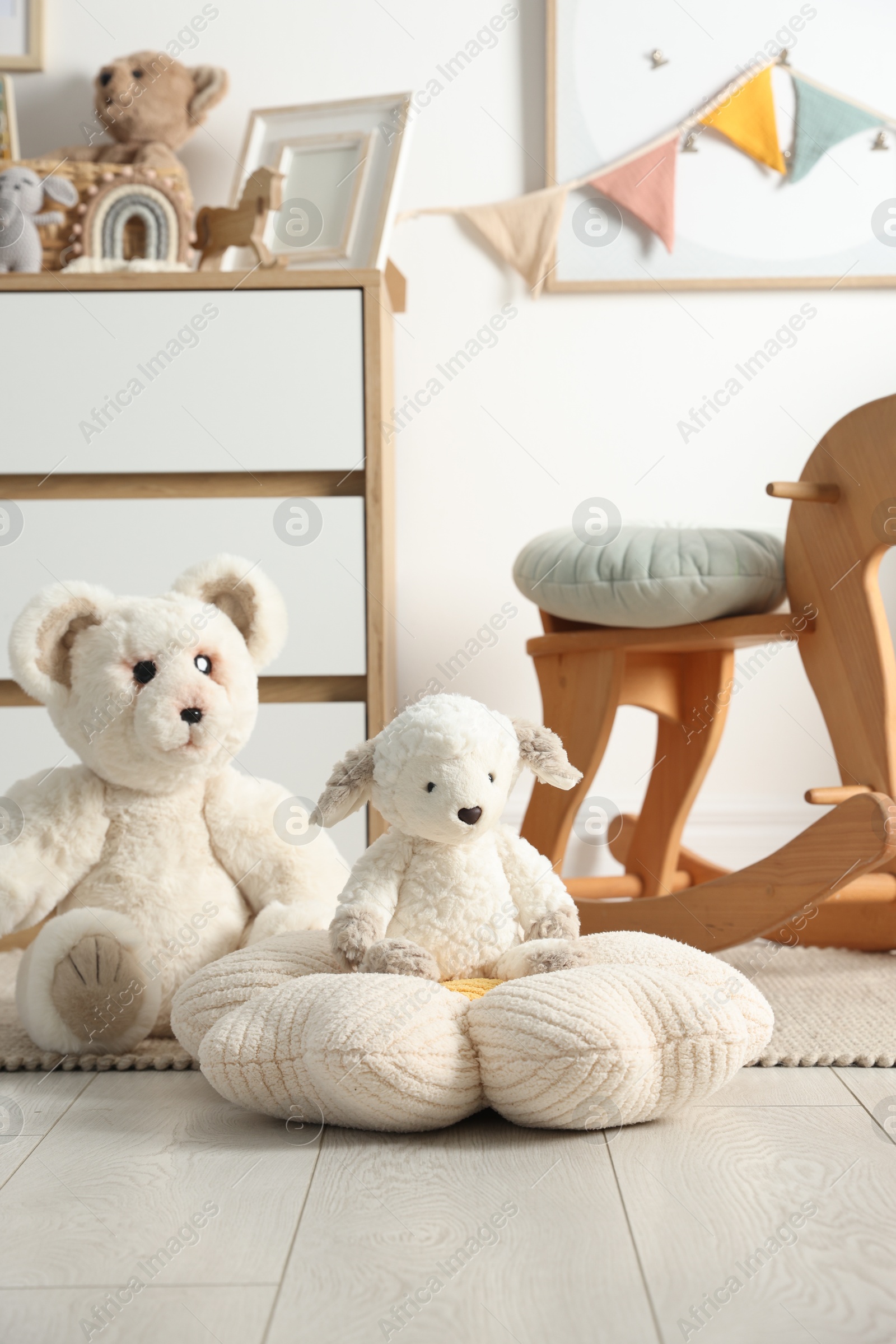 Photo of Different cute toys and furniture in child's room