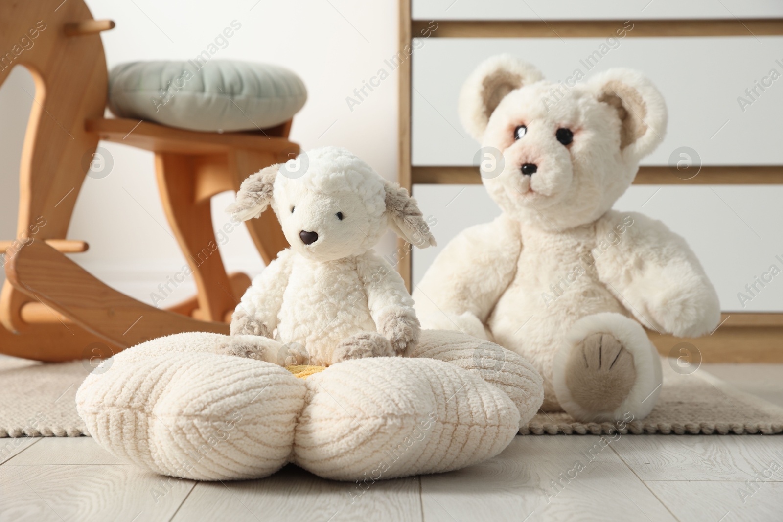 Photo of Different cute toys and furniture in child's room