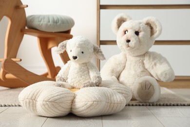 Photo of Different cute toys and furniture in child's room