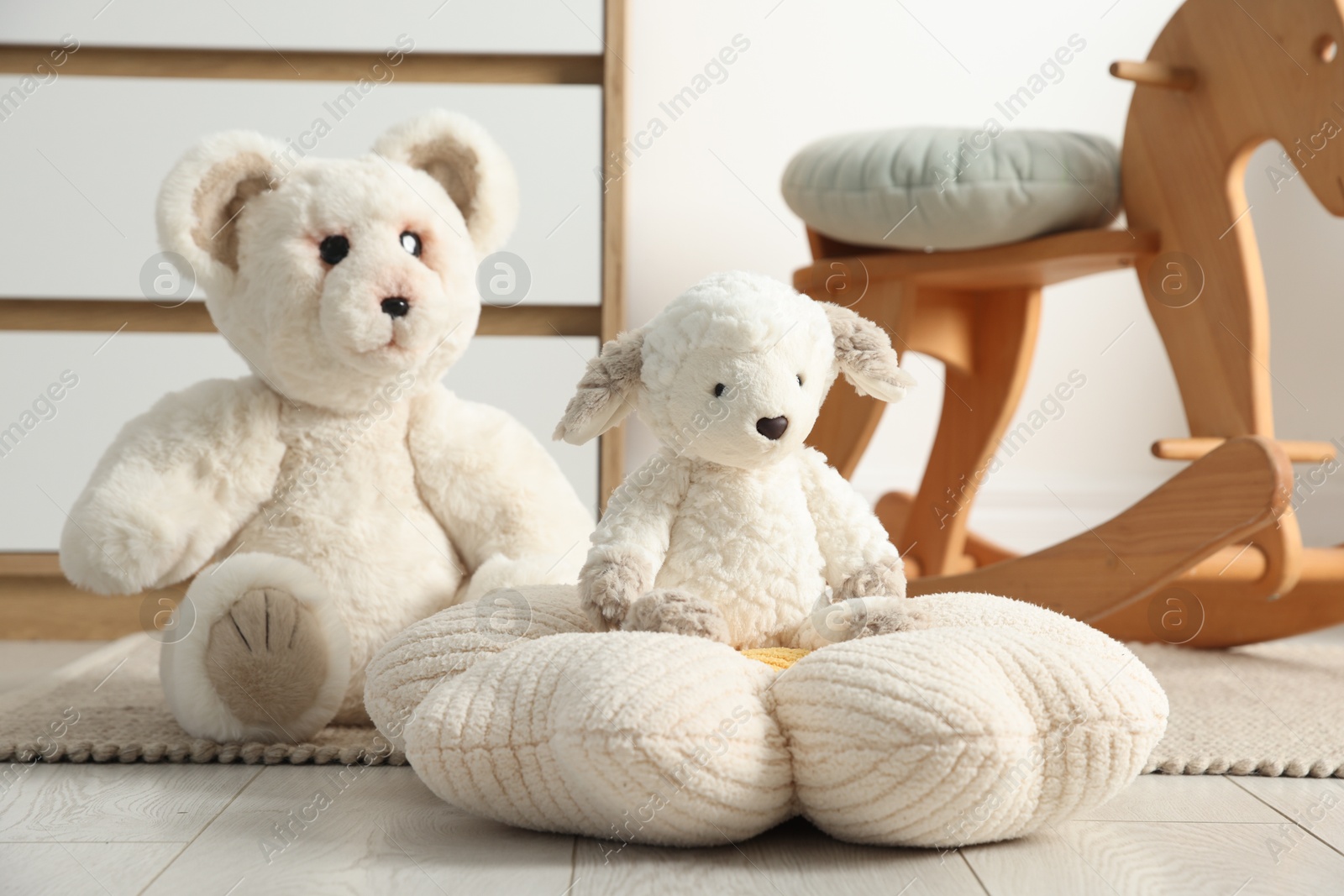 Photo of Different cute toys and furniture in child's room