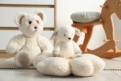 Photo of Different cute toys and furniture in child's room
