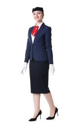 Photo of Charming stewardess in uniform on white background
