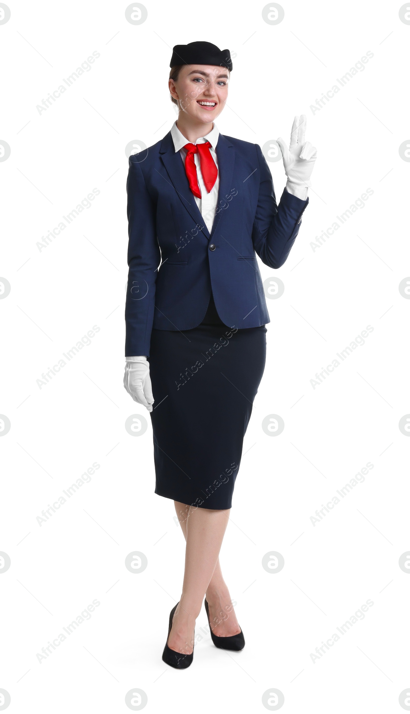 Photo of Charming stewardess in uniform on white background