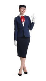 Photo of Charming stewardess in uniform on white background