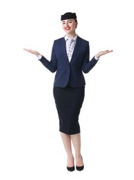 Photo of Positive stewardess doing pre-flight safety briefing on white background
