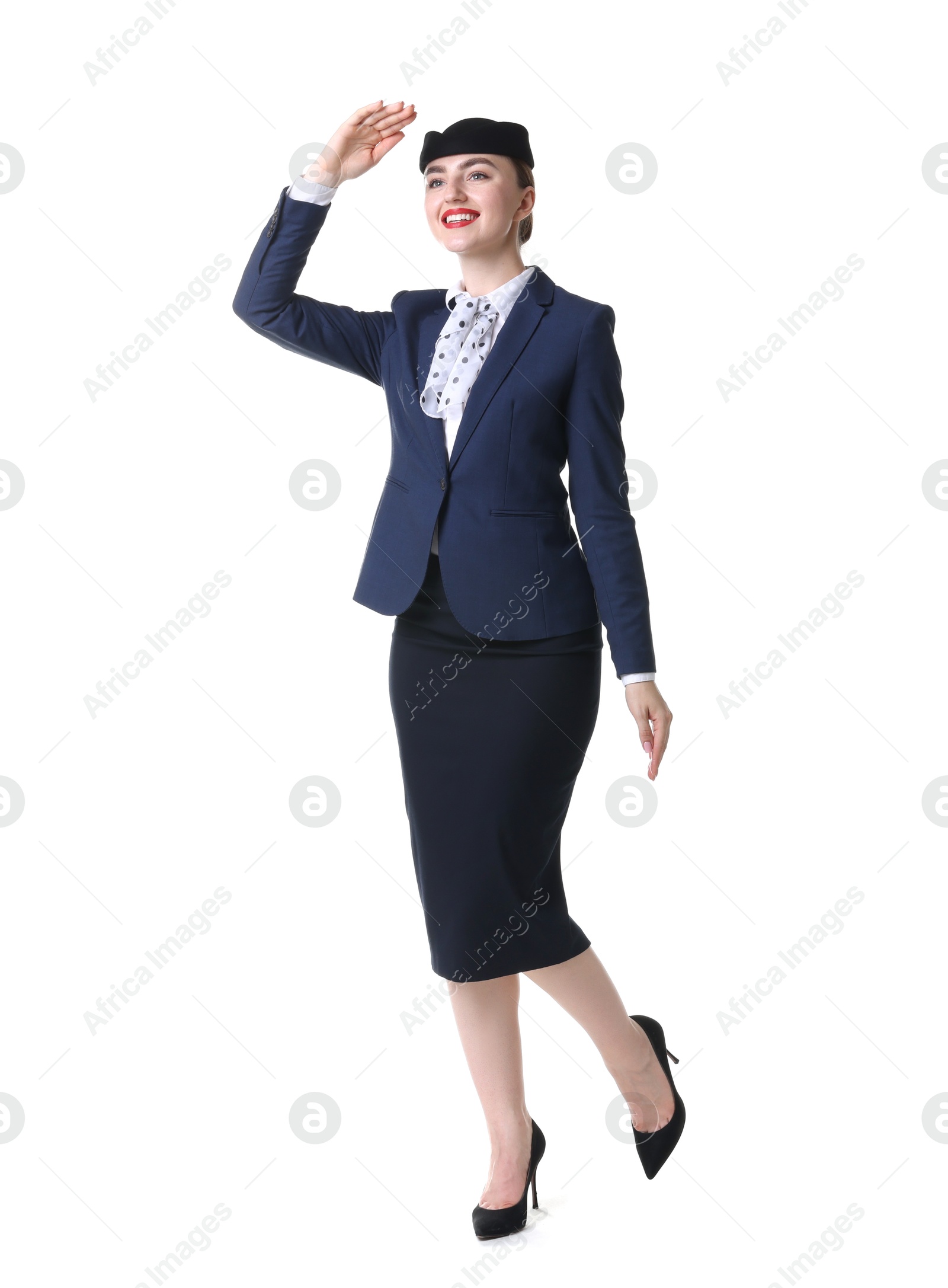 Photo of Charming stewardess in uniform on white background