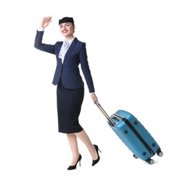 Photo of Positive stewardess with suitcase on white background