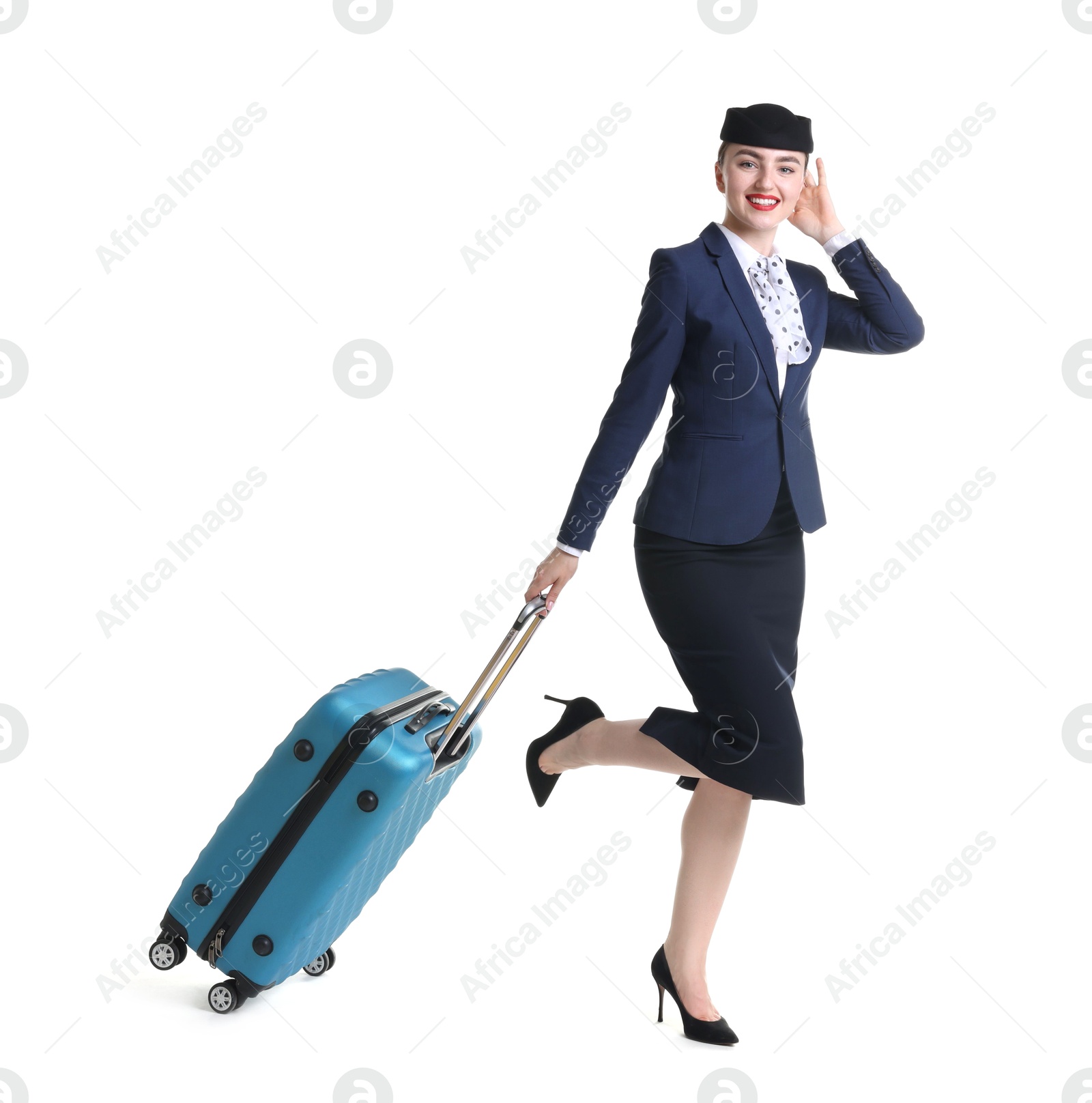 Photo of Positive stewardess with suitcase on white background