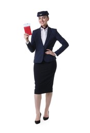 Photo of Smiling stewardess with passport and tickets on white background