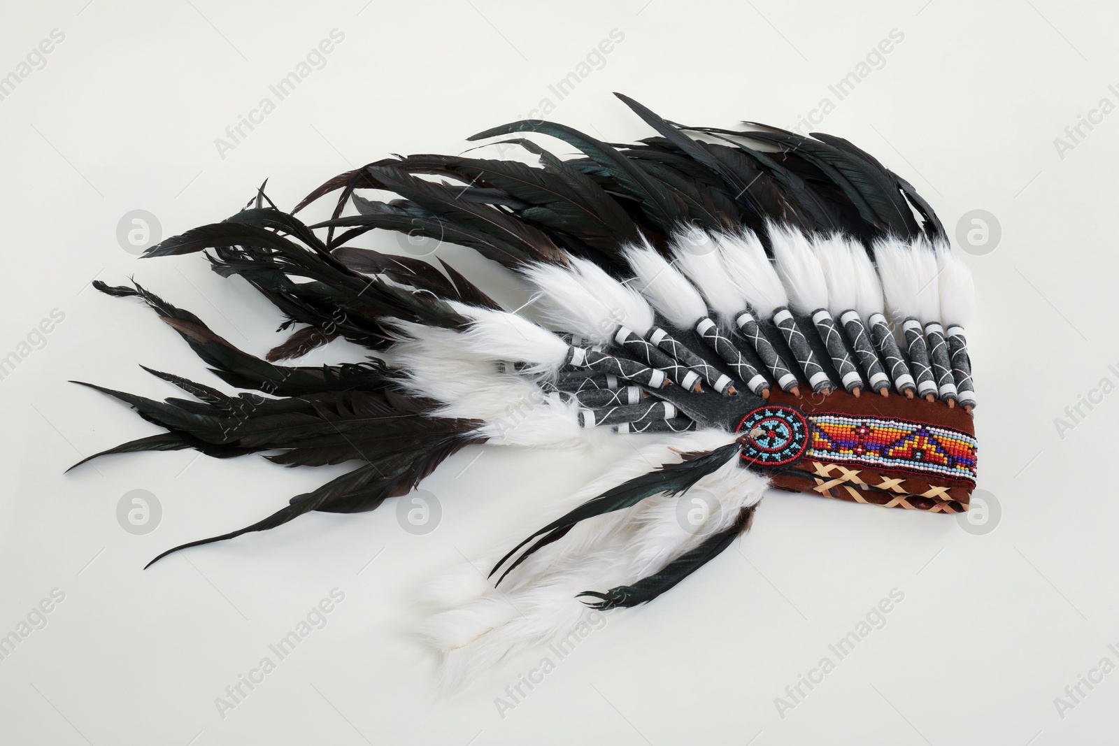 Photo of Traditional warbonnet (Native American chief headdress) isolated on white