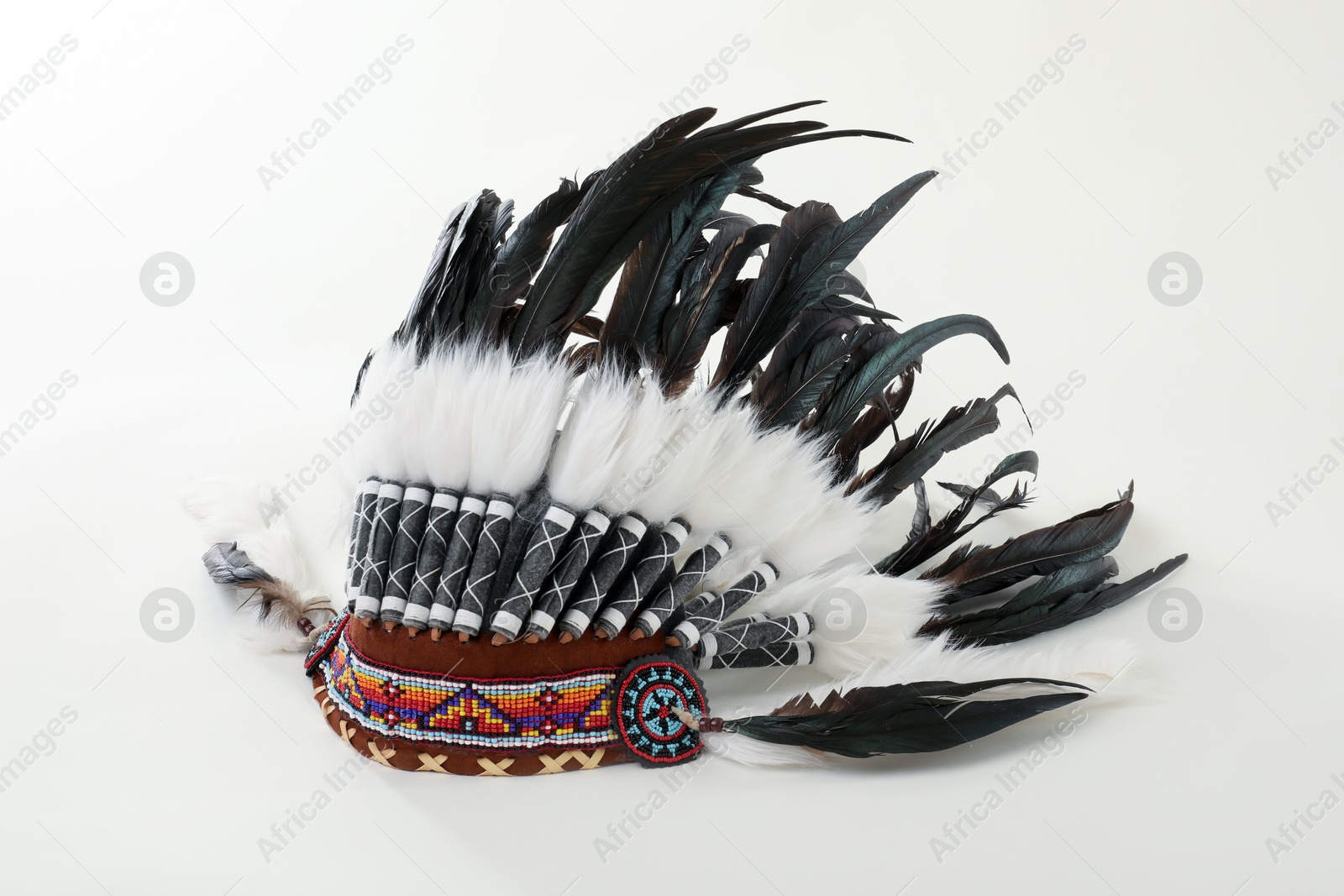Photo of Traditional warbonnet (Native American chief headdress) isolated on white