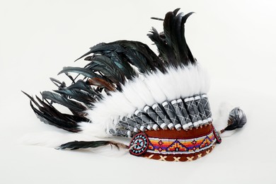 Photo of Traditional warbonnet (Native American chief headdress) isolated on white
