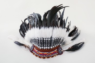 Photo of Traditional warbonnet (Native American chief headdress) isolated on white