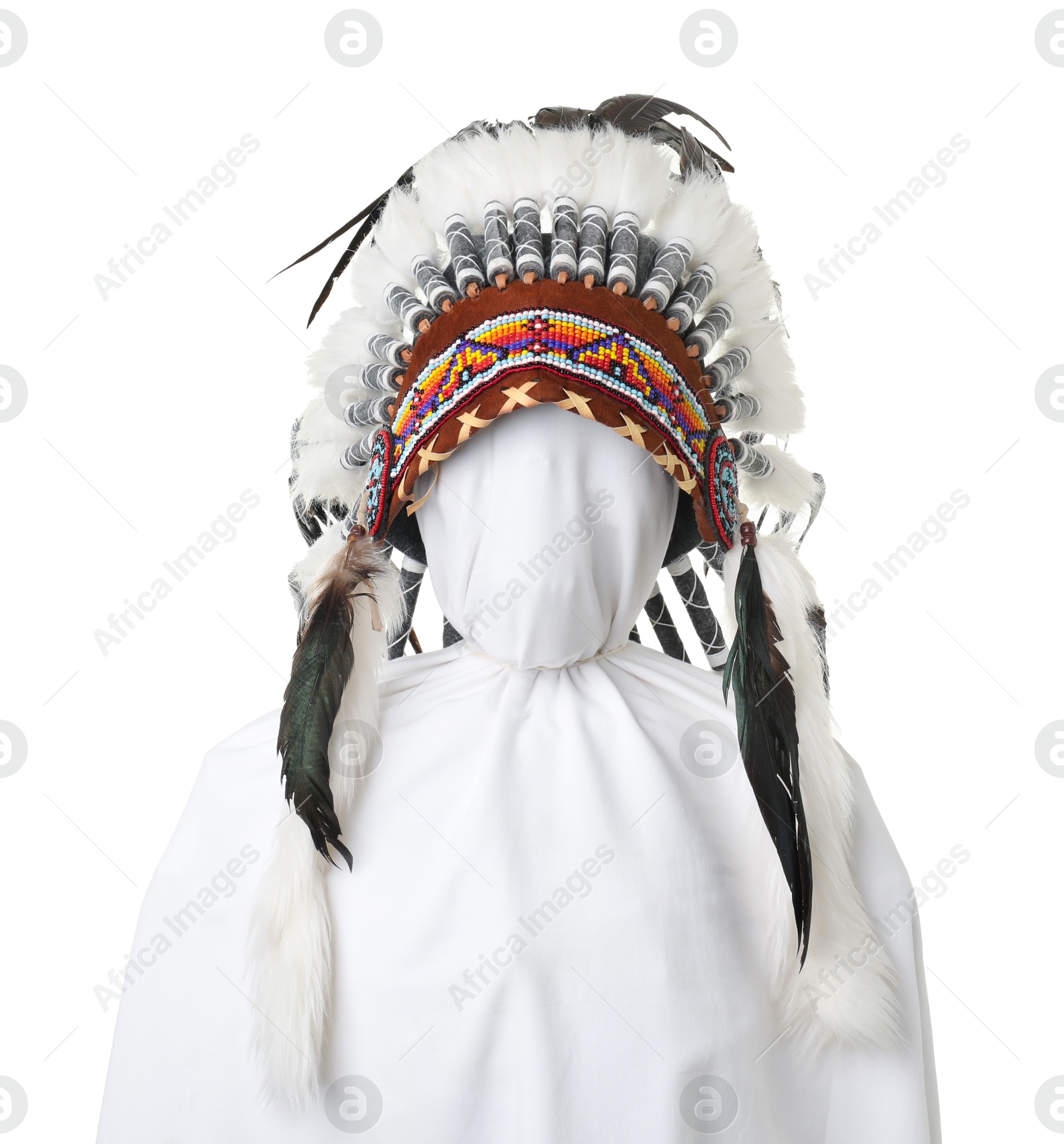 Traditional warbonnet (Native American chief headdress) isolated on white Photo of Traditional warbonnet (Native American chief headdress) isolated on white