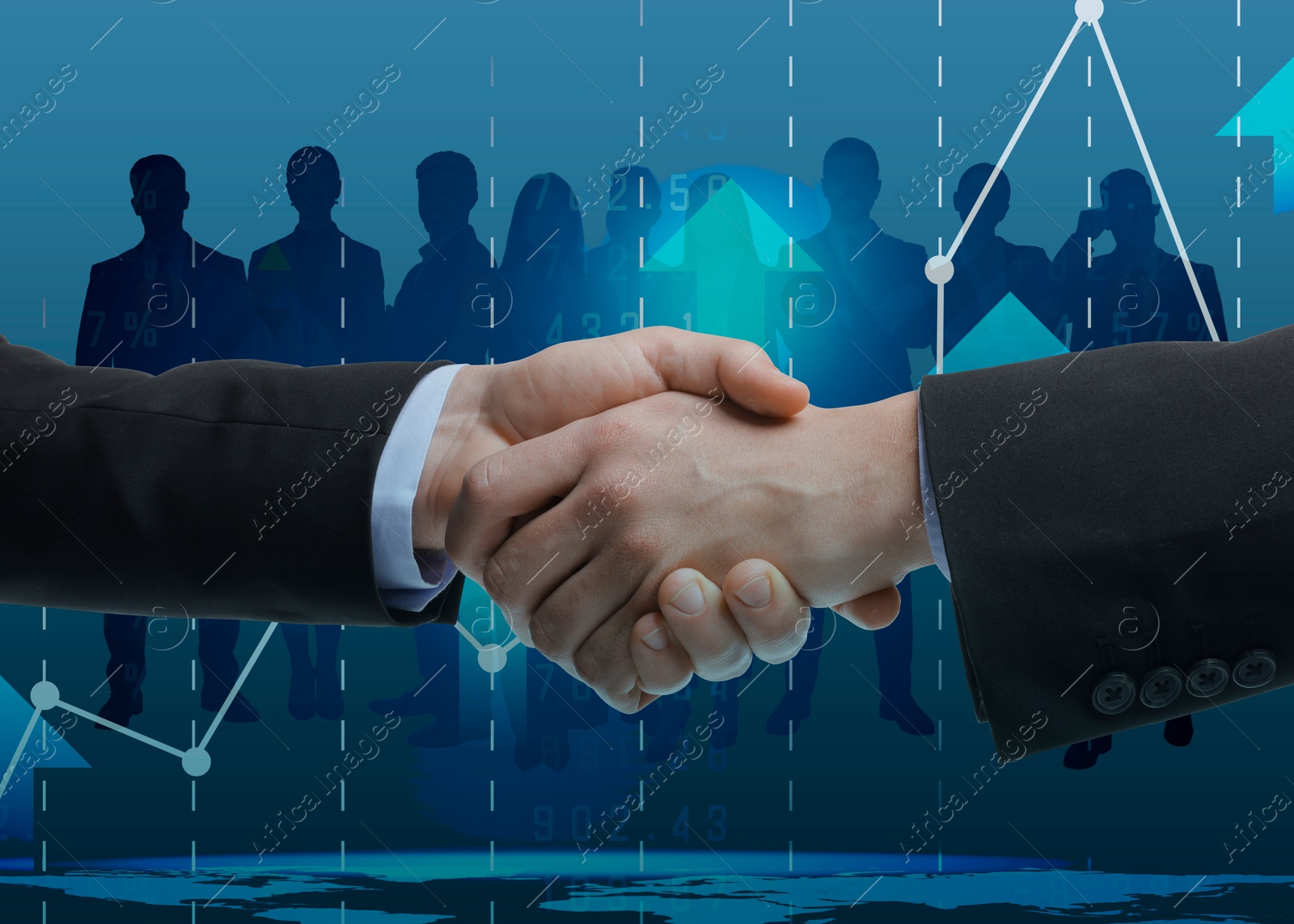 Image of Business partners shaking hands against silhouettes of people